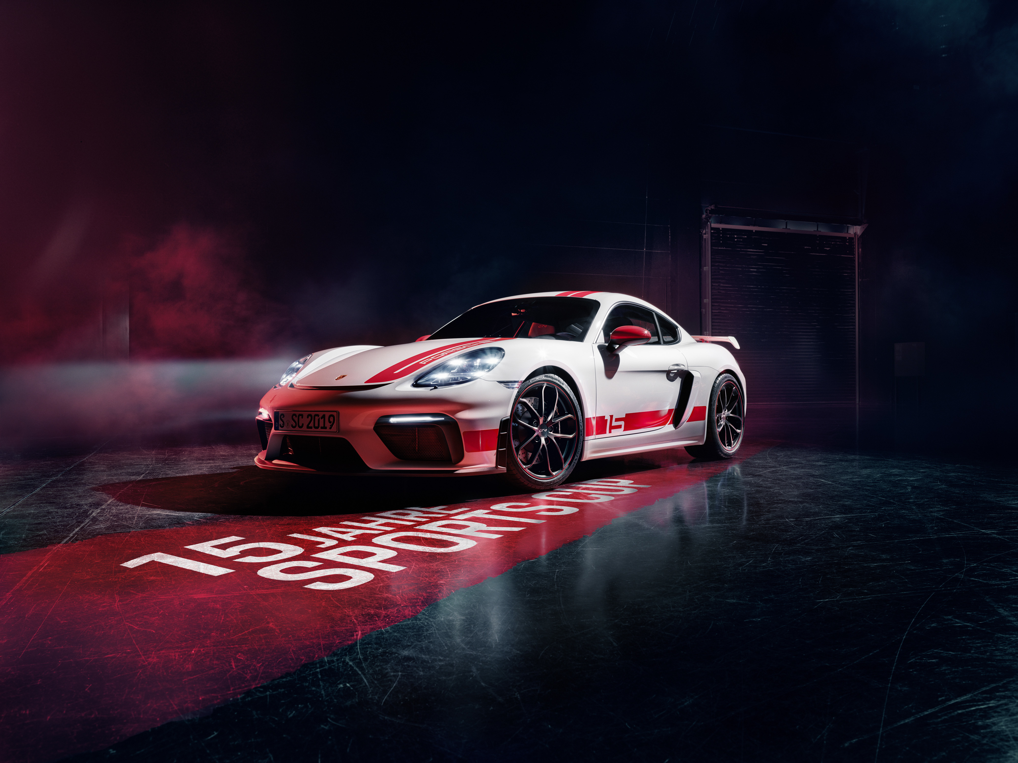 Download Sleek Porsche sports car on a stunning iPhone wallpaper. Wallpaper  | Wallpapers.com