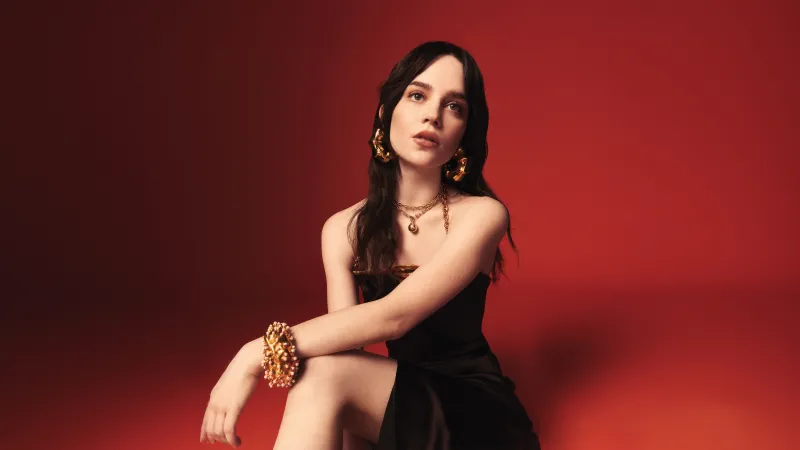 Sophie Thatcher wallpaper, Vogue photoshoot, Red background, Black dress