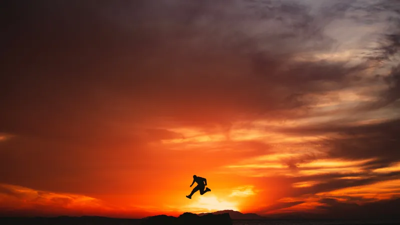 Jumping man silhouette, Fiery sunset, Hisma Desert, 8K wallpaper