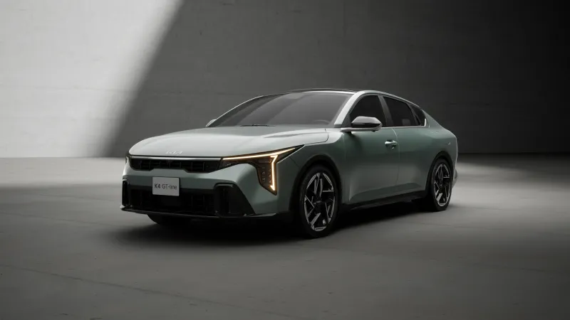 Kia K4 GT-Line wallpaper, Green sedan, Grey studio, 2025, 4K
