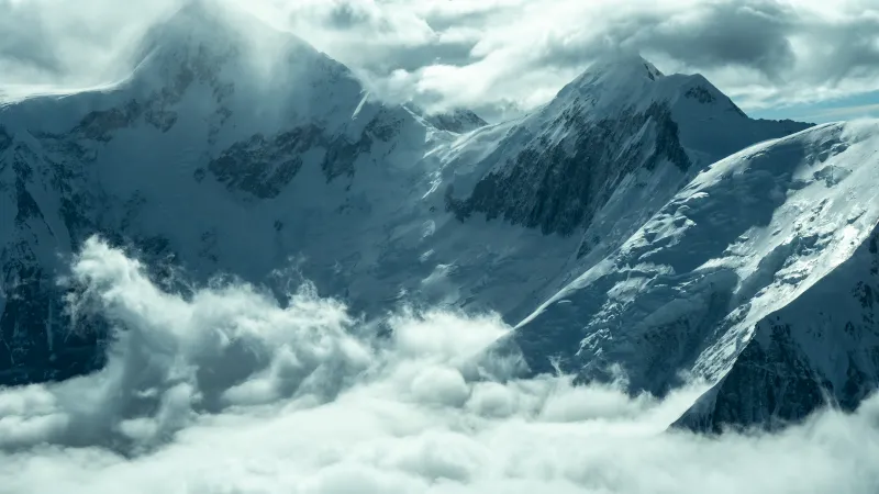 Snowy peaks above clouds, Alpine glacier, Mountains, 5K wallpaper