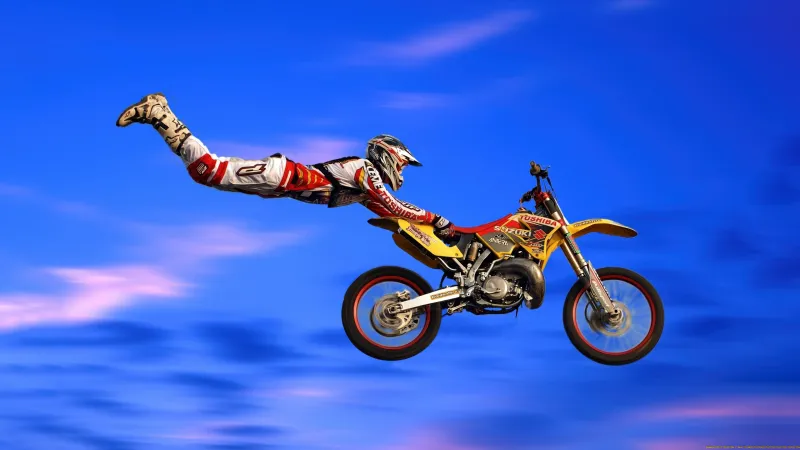 Freestyle Motocross wallpaper, Superman trick, Suzuki RM, Blue sky