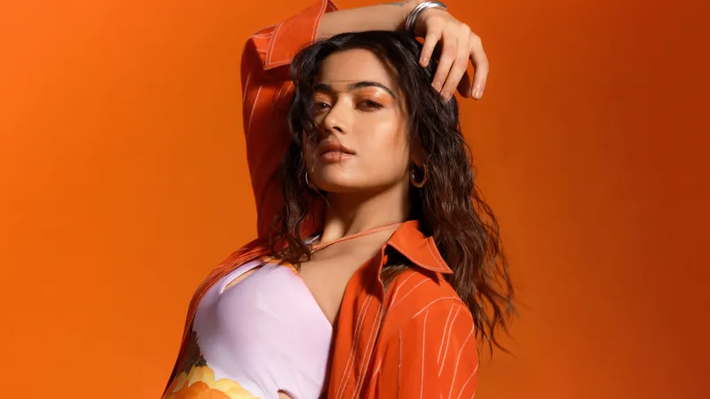Rashmika Mandanna, Orange background 8K
