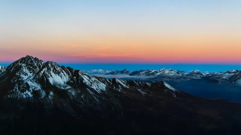 Snowy peak at sunrise, Alpine ridge, Orange horizon, 4K wallpaper