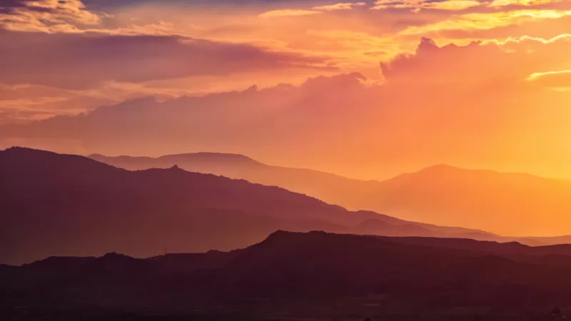Orange sunset wallpaper, Layered mountains, Golden clouds