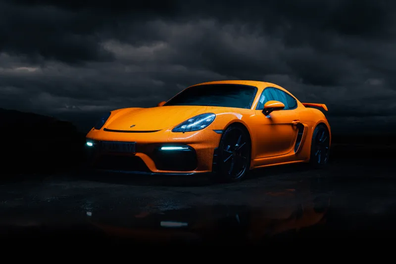 Porsche 718 Cayman GT4, Orange sports car, Stormy sky, Dark, 5K wallpaper
