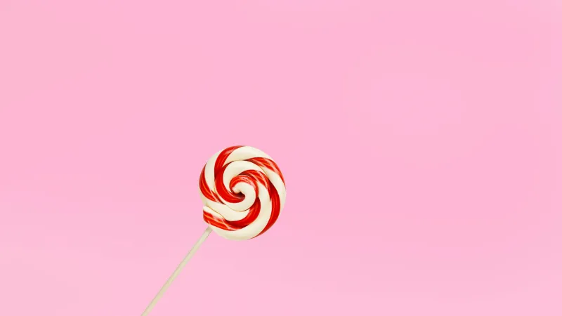 Swirl lollipop pink background