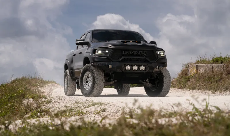 Ram 1500 TRX, Black off-road pickup, Gravel trail, Cloudy sky wallpaper