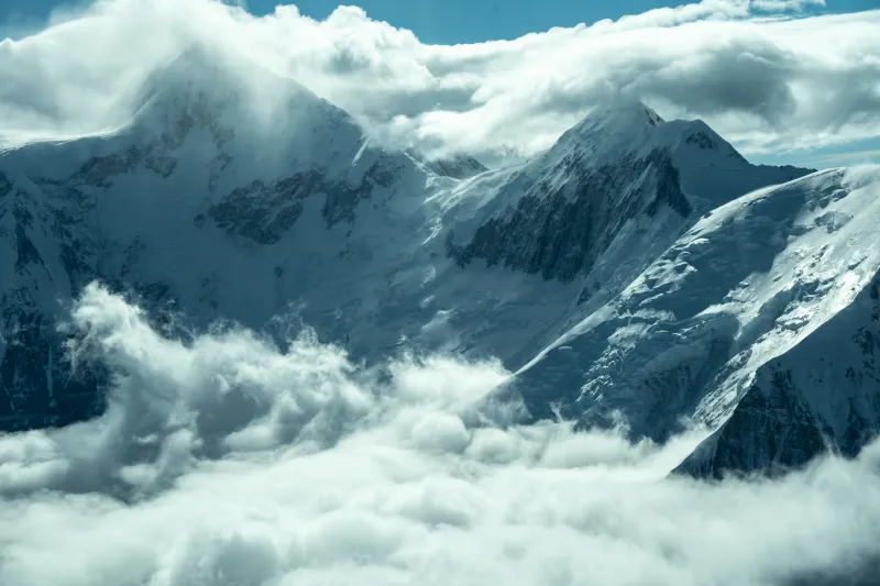 Snowy peaks above clouds, Alpine glacier, Mountains, 5K wallpaper