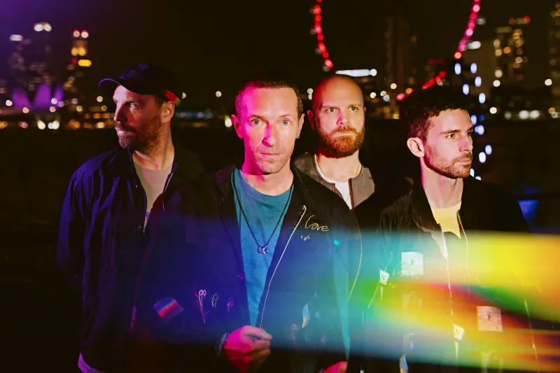 Coldplay wallpaper, Music band, Chris Martin, Night city, Vibrant colors