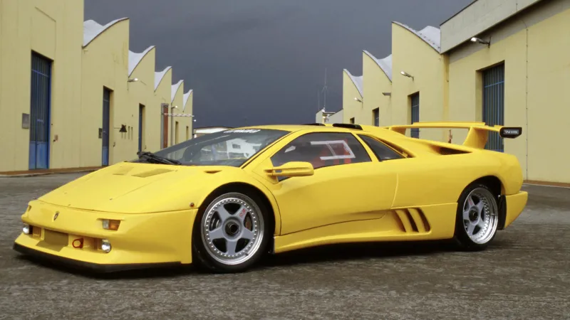 Lamborghini Diablo, Yellow car, Supercar, Rear wing, Industrial background, Dark sky