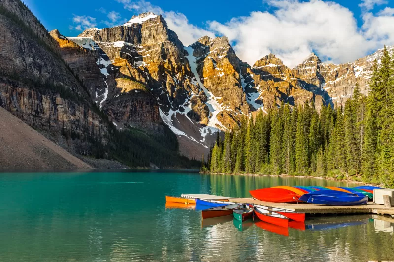 Moraine Lake, Kayak boats, Multicolor, Mountain range, Snow covered, Day time, Cloudy Sky, Landscape, Scenery, Beautiful, Green Trees, 5K